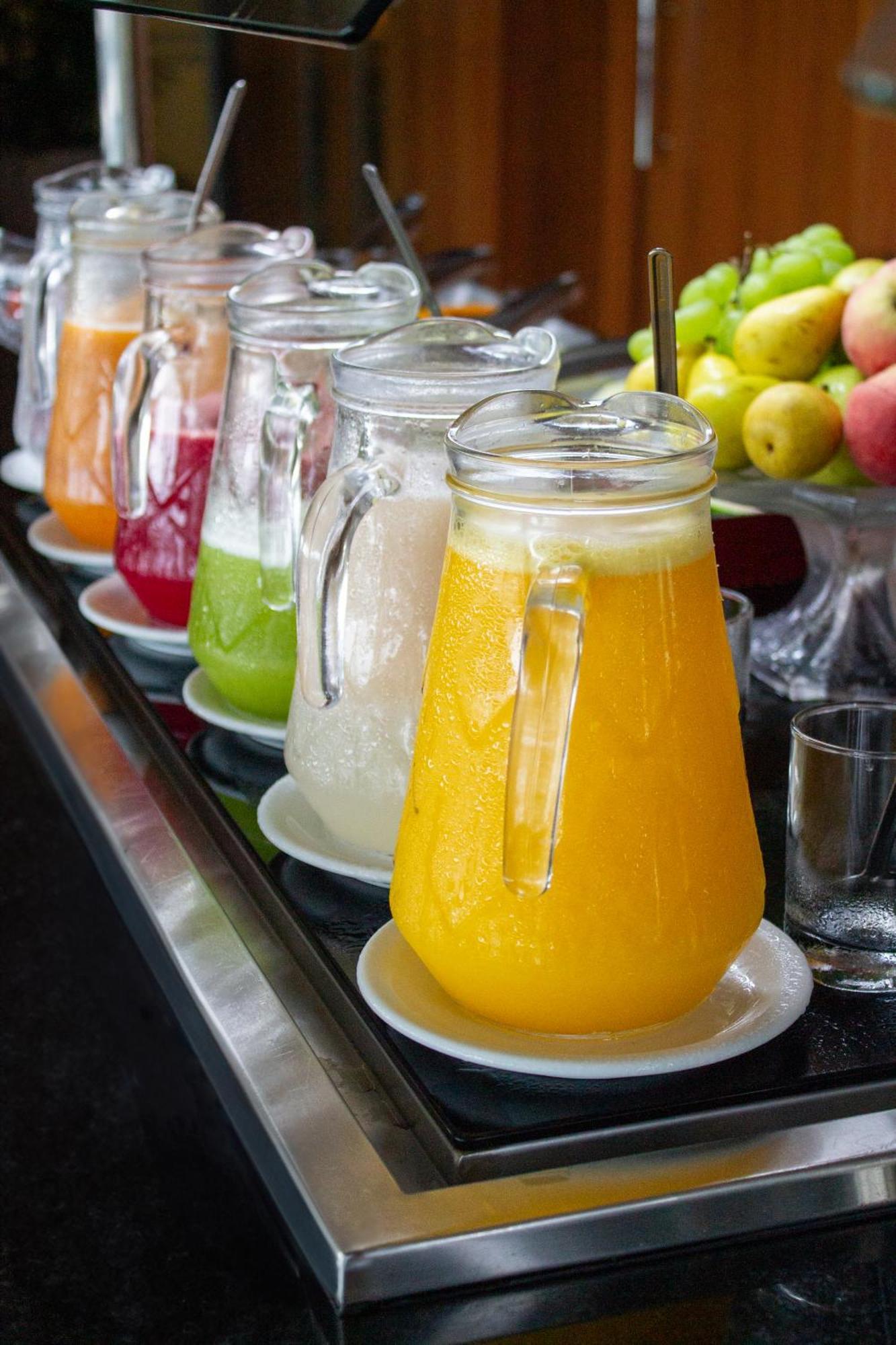 Hotel Senac Ilha Do Boi Витория Экстерьер фото A pitcher of orange juice